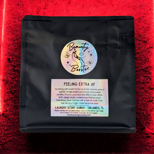 Black packaging with a colorful label on a red textured background
