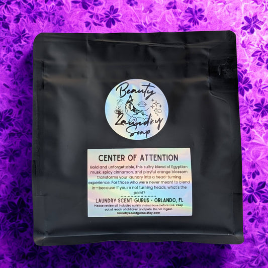 Black packaging with a colorful label on a purple floral background