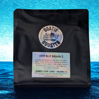 Black bag with 'Boatie Booster' label on a blue water background